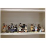 Collection of 12 Royal Doulton Bunnykin figures including Captain/s Wife, Teacher, Mother