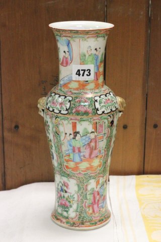 Chinese vase with famillee rose ground decorated with panels of figures and birds with flowers