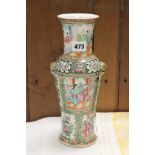 Chinese vase with famillee rose ground decorated with panels of figures and birds with flowers