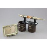 Art Deco style Five Rams Chinese clock, Two leather dice shakers marked K.B.G.C Hong Kong 1947 and