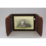 Early 20th C brown leather double opening picture case with easel back containing a watercolour of