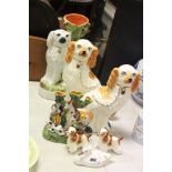 Pair of Staffordshire mantle dogs, Staffordshire dog spill vase (af), Rye pottery duck & three other