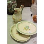 Three items of Clarice Cliff including jug and two plates