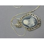 Silver pendant necklace depicting the Virgin Mary