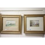 Two gilt framed watercolours of village landscape scenes