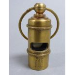 Brass whistle stamped Titanic