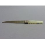 Oriental white metal knife with a carved Jade handle