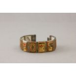 Early 20th C Persian panel bracelet decorated with painted enamel mother of pearl figurative and