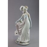 Lladro lady with feathered head band impressed to base F275