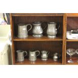 Seven pewter mugs including Victorian