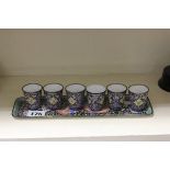 Six Cloisonne Tot Beakers on a Tray