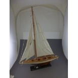Model yacht on stand approximately 26.5" in length