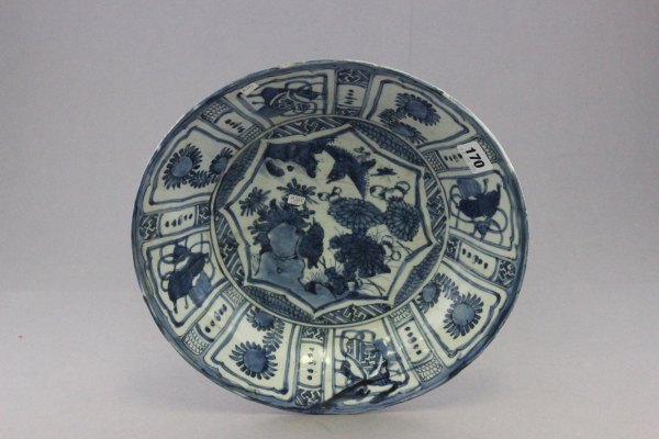 19th C Chinese blue & white dish with floral panels and bird decoration to centre