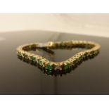 14ct y/gold emerald and diamond bracelet