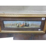 Gilt framed oil painting of a Victorian beach scene with figures