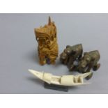 Two Small Cast Metal Indian Elephants on Wheels, Carved Wooden Elephant carrying Figures and a