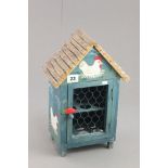 Wooden Egg Cabinet in the form of a Chicken Coop painted with Chickens