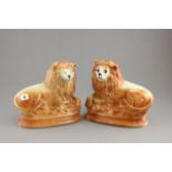 Pair of Staffordshire Mantle Lions (one lacking eyes)