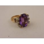 Y/Gold large 7ct amethyst and diamond ring