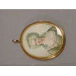 Late 18th / Early 19th century Oval Miniature Portrait of a Lady contained in a yellow metal frame