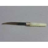 Oriental white metal knife with a carved Jade handle