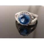 Silver and blue topaz dress ring