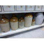 Two Stoneware Jars marked Sodastream, Three Other Stoneware Jars and a Zinc Churn