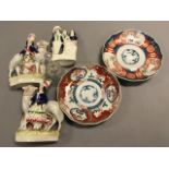 Pair of 19th century Staffordshire Flatbacks of Man and Woman stood by Sheep plus another