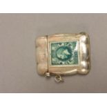 An unusual silver vesta case with attached ceramic stamp