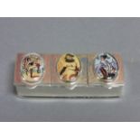 Silver and enamel three section lidded pill box with erotic scenes