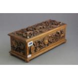 Walnut Table Top Box heavily carved with flower and leaves