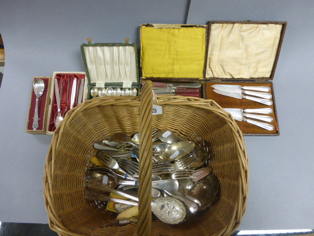 Wicker Basket with Various Loose and Boxed Cutlery