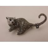 Silver and marcasite cat brooch with garnet eyes