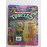 Original carded Playmates Teenage Mutant Ninja Turtles Raphael figure early '10 Back' run, un-