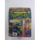 Original carded Playmates Teenage Mutant Ninja Turtles Slash figure, unpunched, unopened