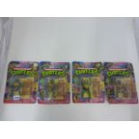 Set of four original carded '10 Back' Playmates Teenage Mutant Ninja Turtles figures including