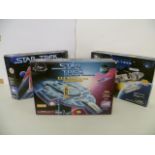 Three boxed Playmates Star Trek vehicles comprising of 16140 USS Defiant NX-74205, Phoenix Earp