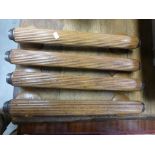 Four large Arts & Crafts oak door pulls with bronze fittings
