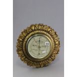 Atsonea Circular Barometer in Gilt Plaster Scroll Frame marked Short & Mason London