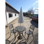 Metal Bistro Table plus a pair of metal garden chairs and parasol