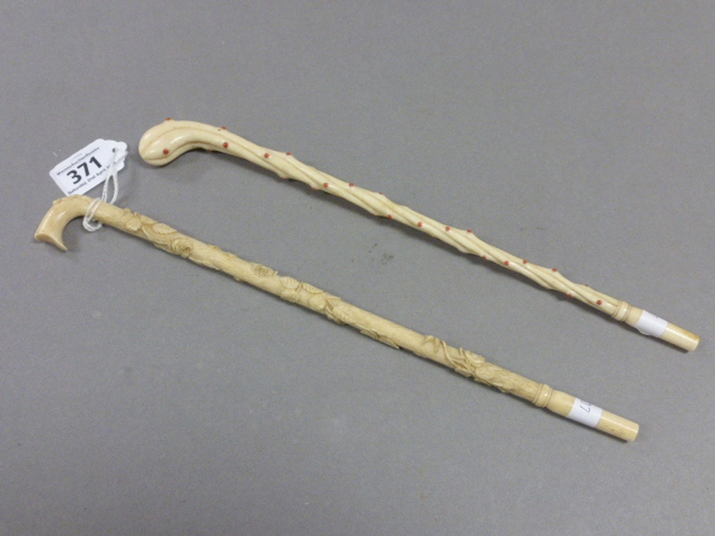 Two Carved Bone Parasol Handles