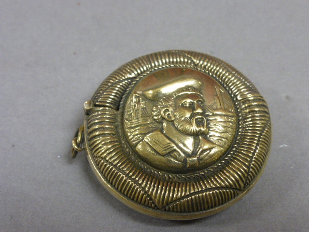 Brass vesta case depicting sailors