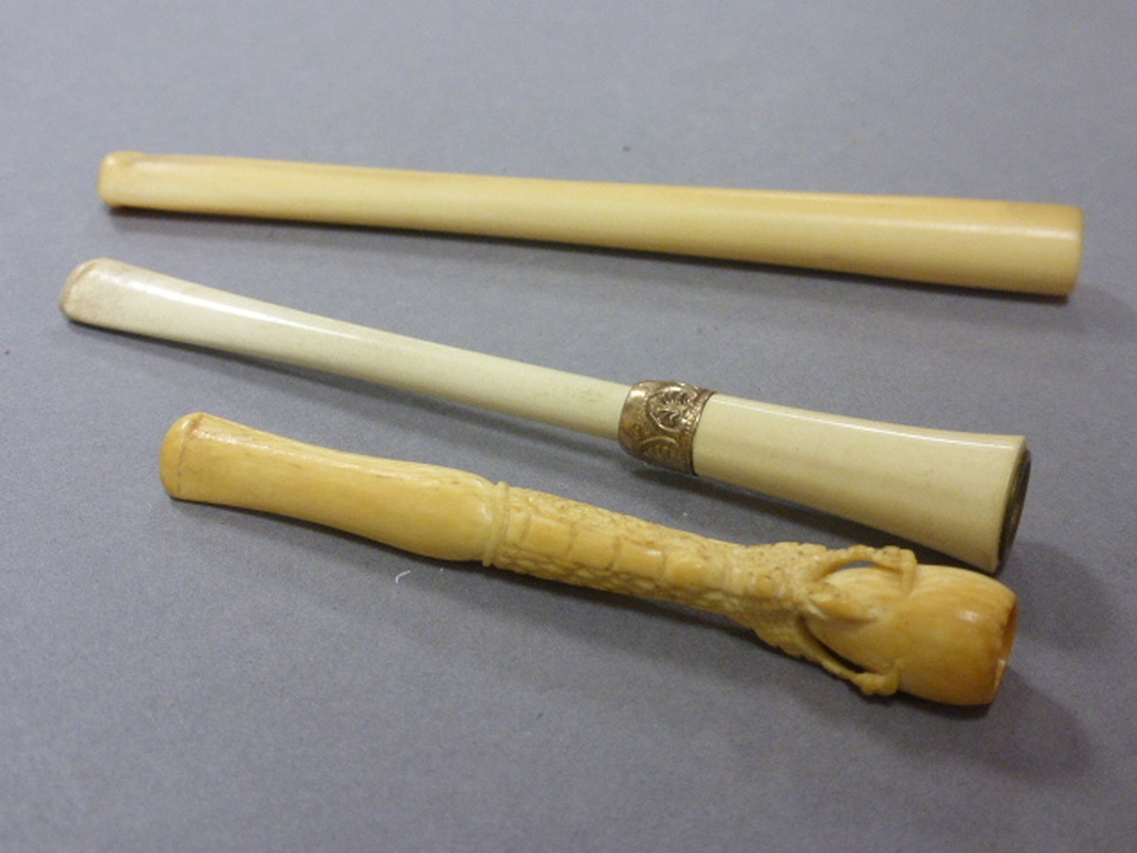 Three Bone / Ivory Cheroot Holders, one in the form of a birds claw