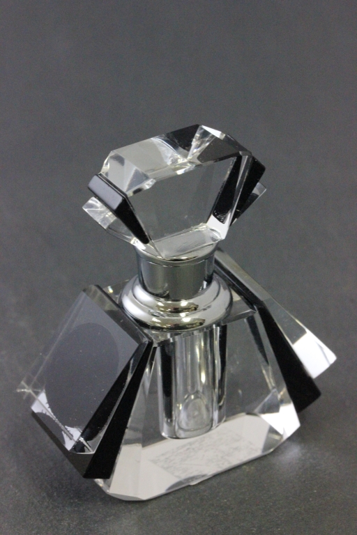 An Art Deco style fan shaped perfume bottle