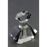 An Art Deco style fan shaped perfume bottle