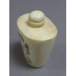 White bone snuff bottle decorated with erotic scenes