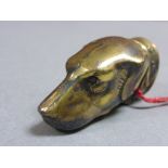 Brass vesta case in the form a dog with glass eyes