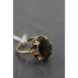 9ct Gold Ring set with a Large Oval Amethyst