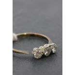 18ct Gold and Platinum Ring set with a row of equal sized diamonds