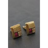 Pair of Gentleman's Yellow Metal Cufflinks marked 585 set with Red Panels and Clear Glass Stones
